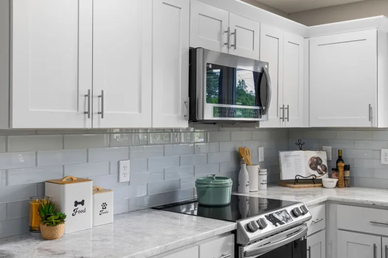 Standing Waves and Cold Spots: The Electromagnetic Physics Your Microwave Reveals Every Day